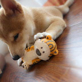 Dog Play With Tiger Toy